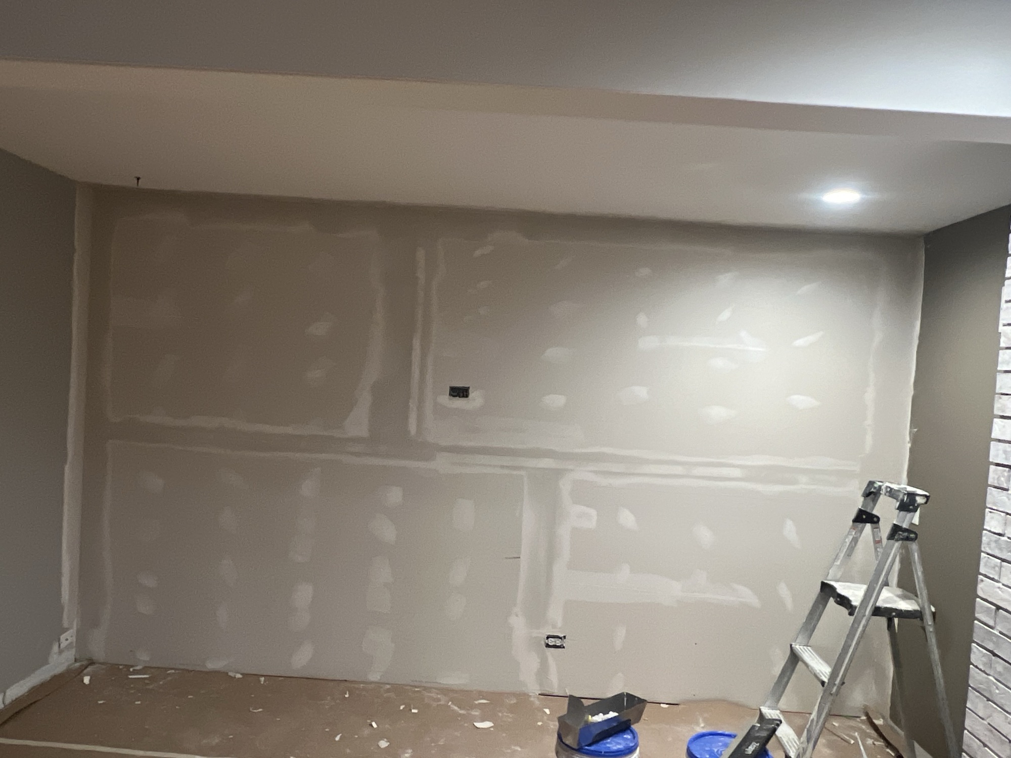 Basement wall drywall taping