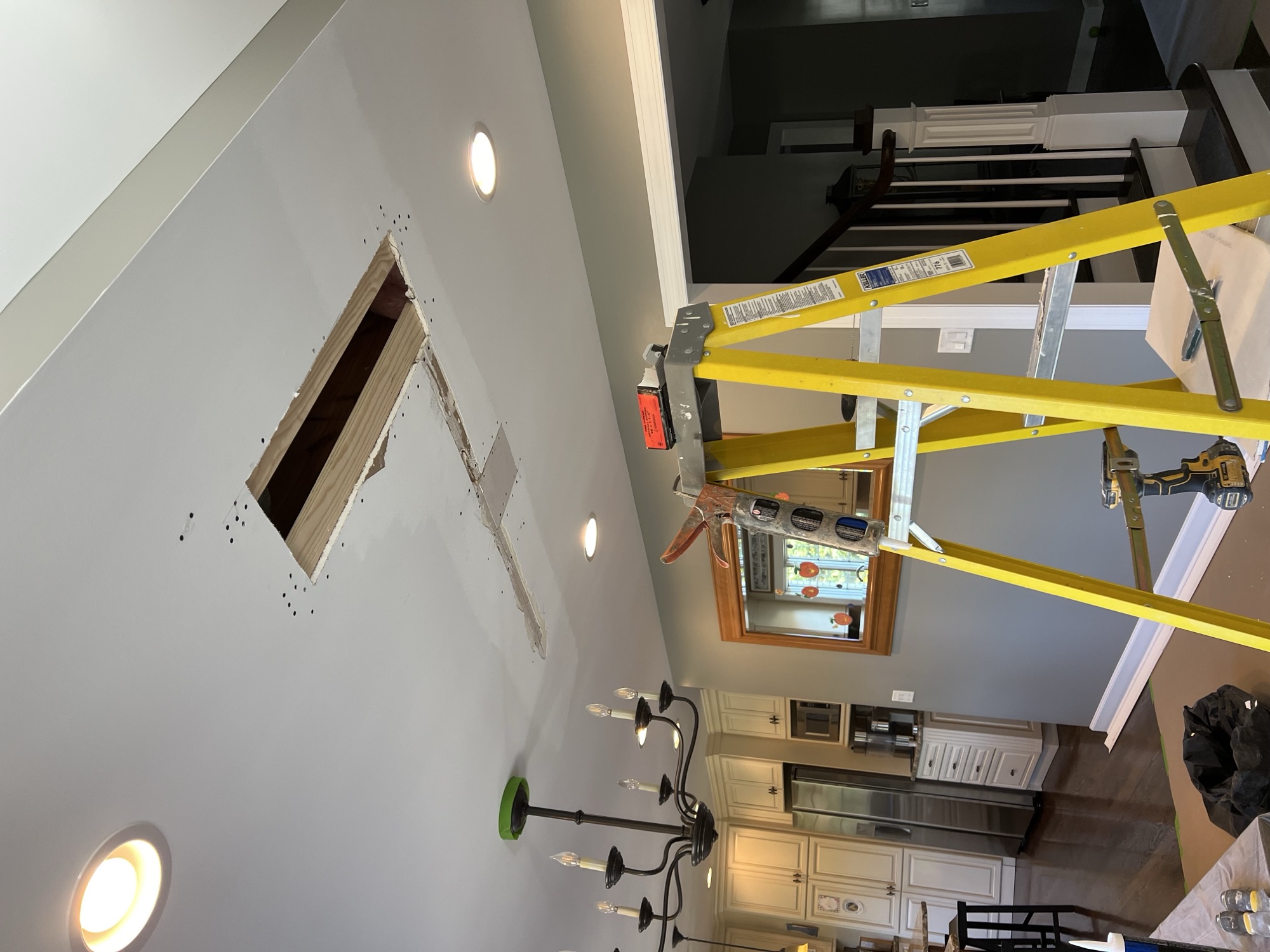 Ceiling drywall repair opening
