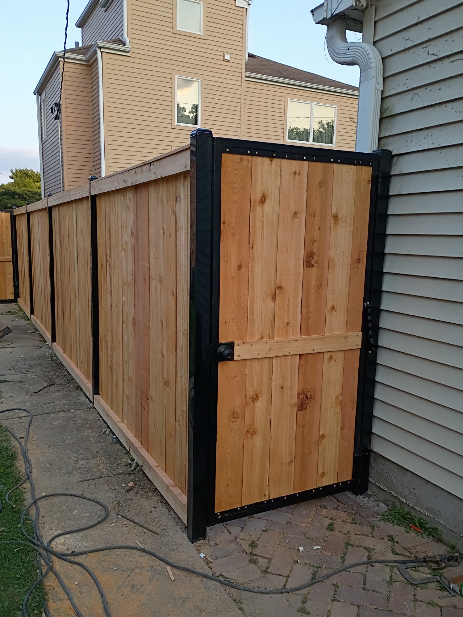 Cedar fence gate black posts