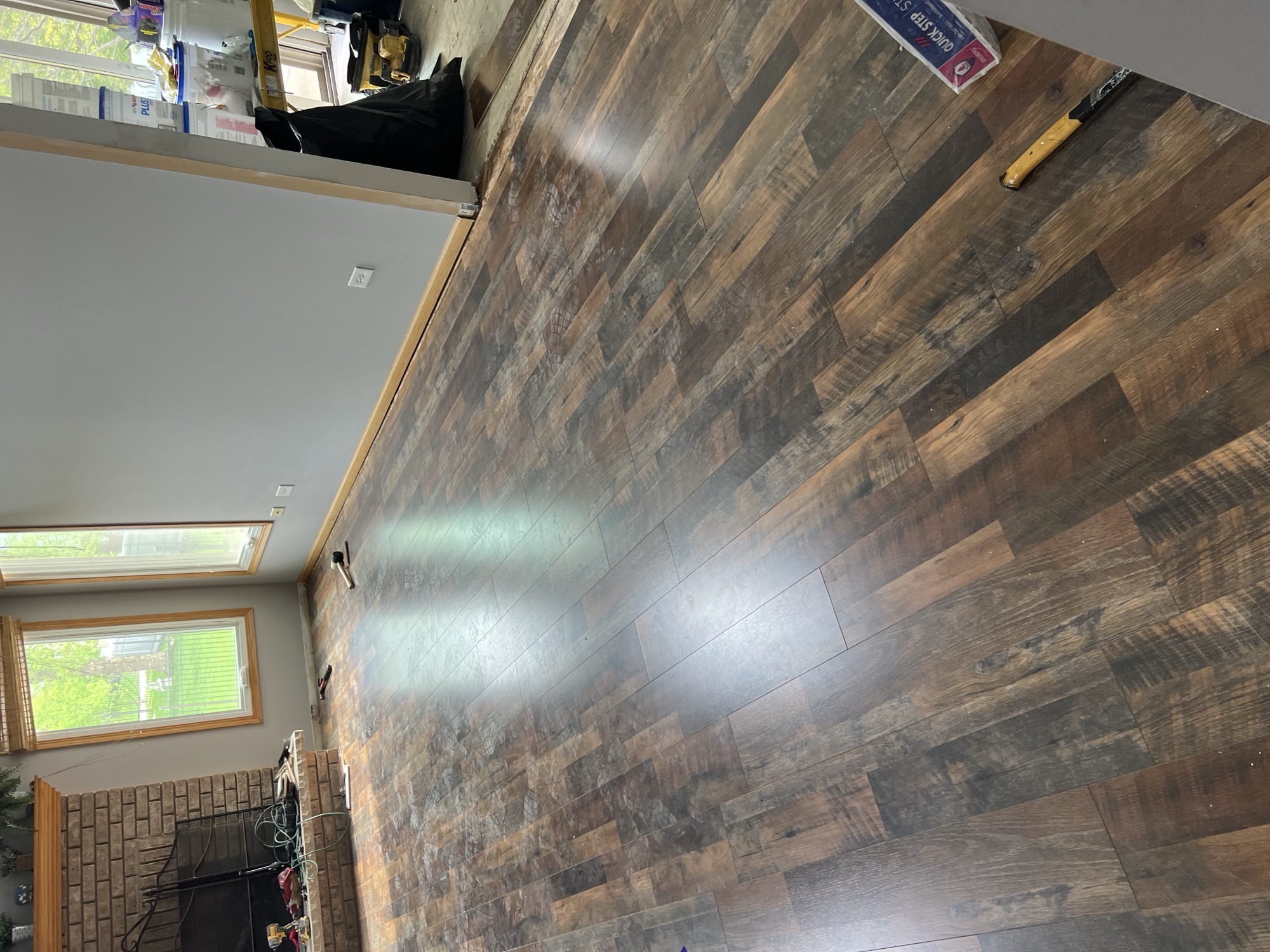 Rustic plank flooring living room