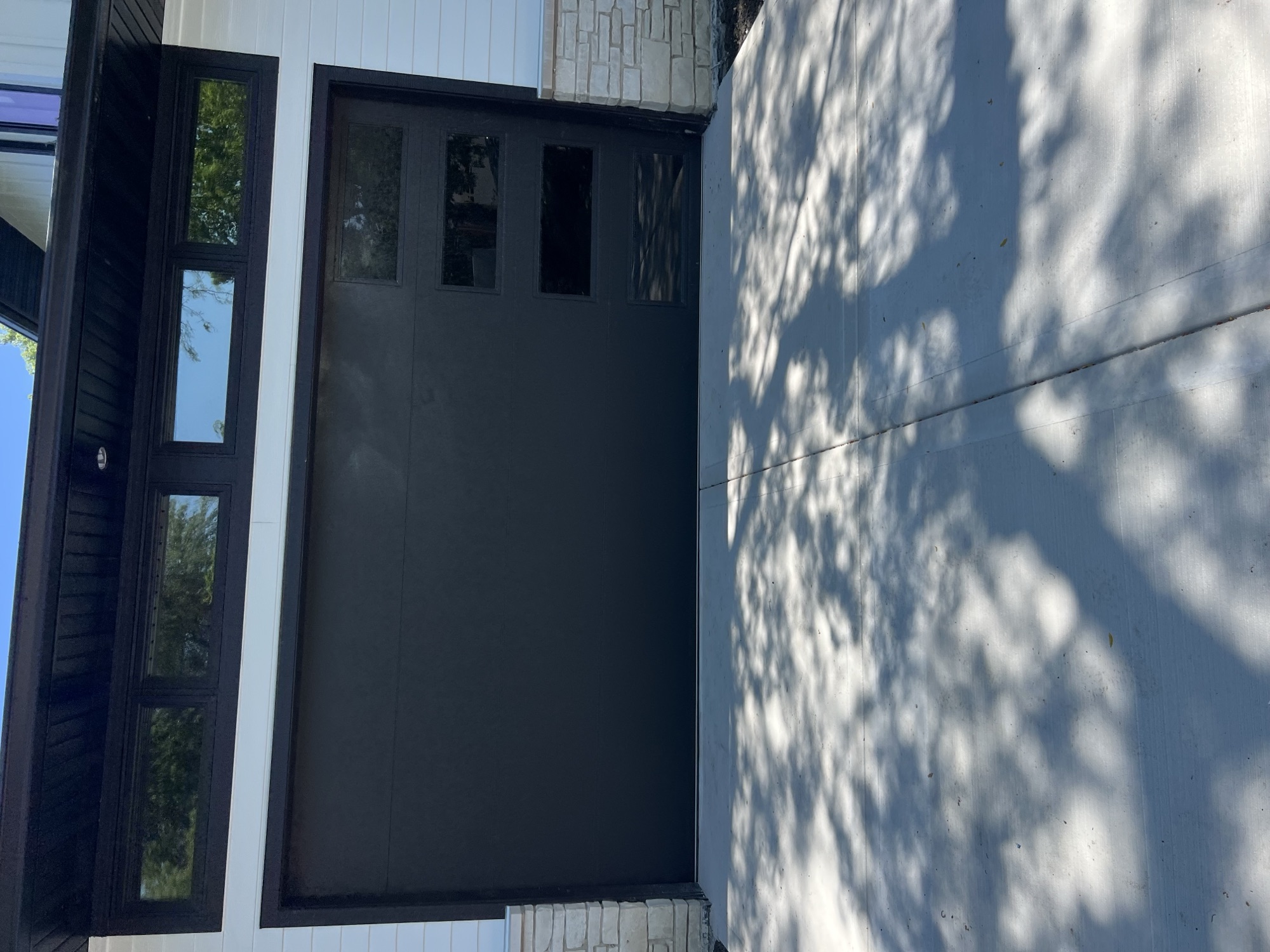 Black modern garage door windows